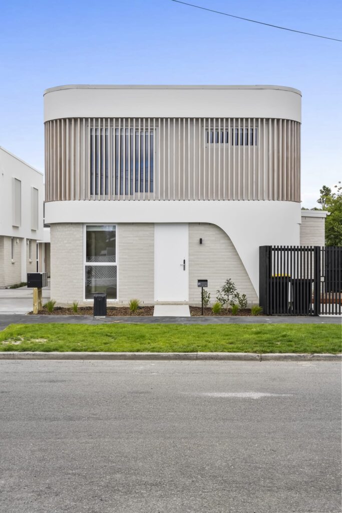 ashby_and_co_Gresford_Street_interior_exterior_15 Exterior townhouse facade with refined rendering, exterior plastering and plaster cladding showcasing Dulux painting plastering and modern architectural lines.